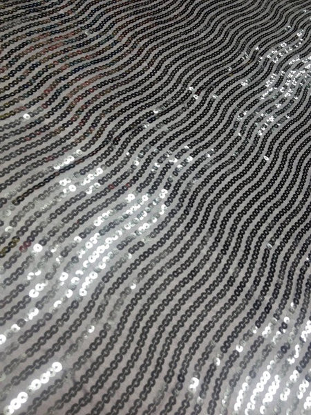 Hypnotic Sequins on Silver Tafetta Fabric Sold by The Yard