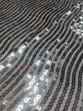 Hypnotic Sequins on Dark Silver Tafetta Fabric Sold by The Yard